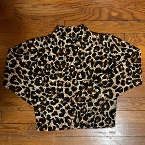 Tiger print fall/winter jacket. Size medium; waist 28